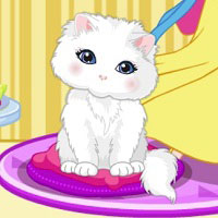 Игра Котенок наряжается Игра Котенок наряжается